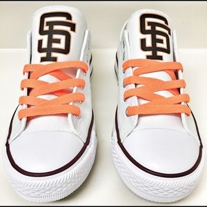White and orange canvas shoes